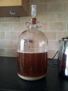 Demijohn containing wine after first steps